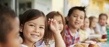 Children sitting down for lunch